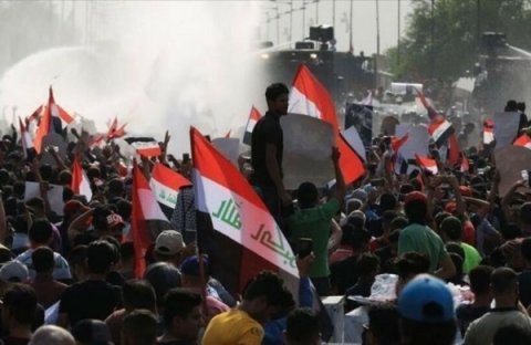 Bağdadda polislə toqquşma - 86 nəfər yaralandı