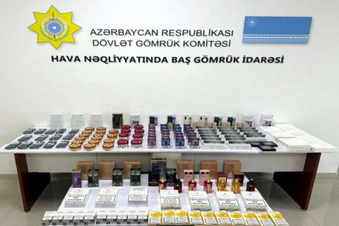 Mallarını gömrükdən keçirmək məqsədilə sərnişinlərə payladı - YAXALANDI